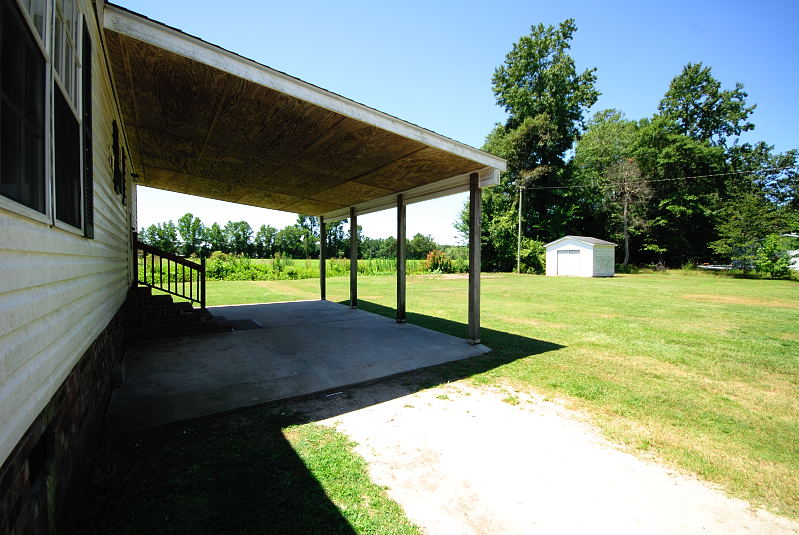 Goldsboro NC - Homes for Rent - 396 Selah Church Road Goldsboro NC 27530 - Carport / Back Yard